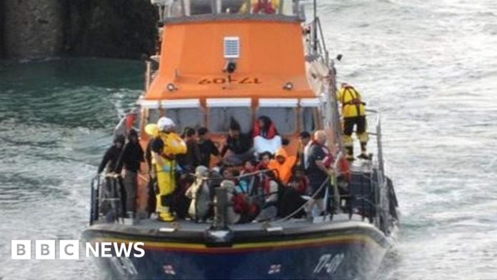 channel-migrants:-france-arrests-four-people-over-fatal-sinking