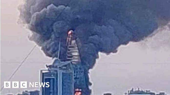 sudan-conflict:-landmark-skyscraper-in-khartoum-engulfed-in-flames