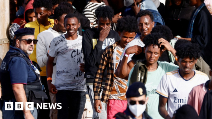 lampedusa:-inside-the-camp-at-the-heart-of-europe’s-migrant-surge