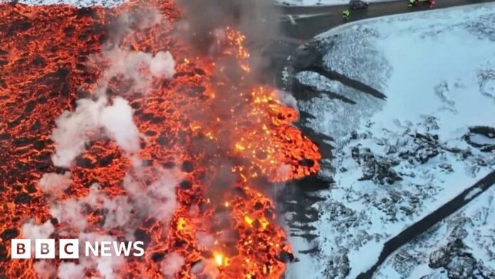 lava-flows-over-roads-and-bursts-water-pipe-after-iceland-eruption